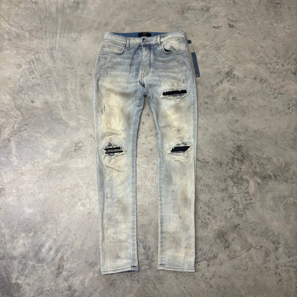 AMIRI JEANS “MX1 DARK NAVY PATCH” RUST