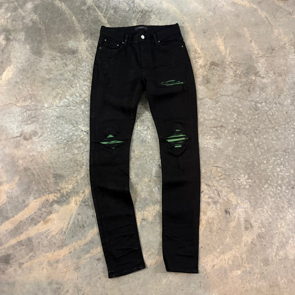 AMIRI “MX1 GREEN PATCH” JEANS