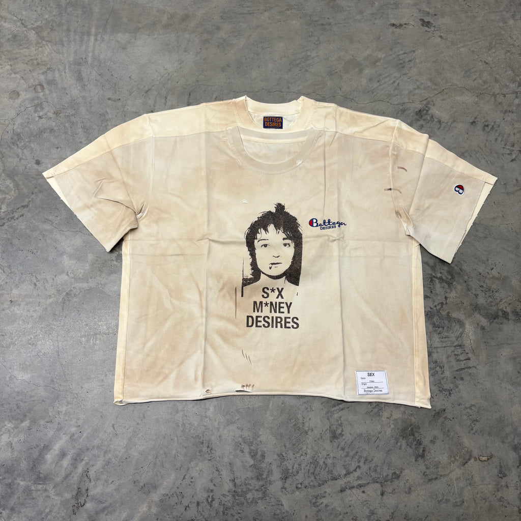 B. DESIRES “S*X SELLS” TEE