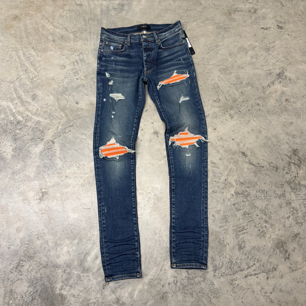 AMIRI JEANS “MX1 ORANGE PATCH”