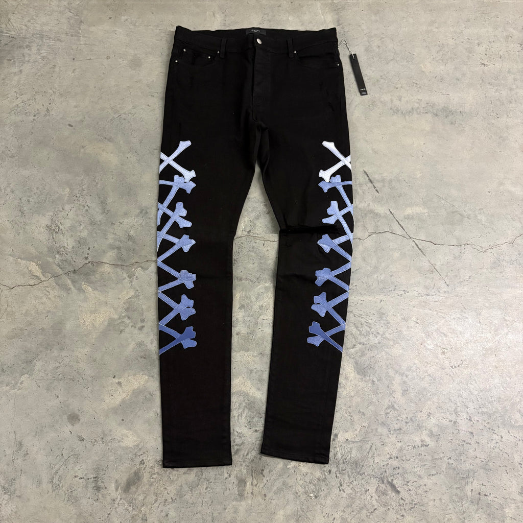 AMIRI JEANS “GRADIENT BLUE BONES”