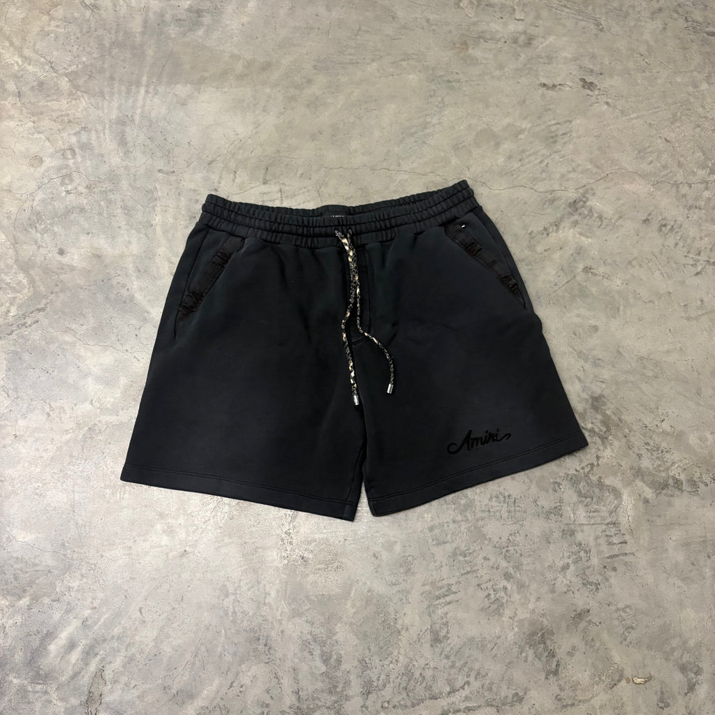 AMIRI “BLACK CURSIVE” SHORTS