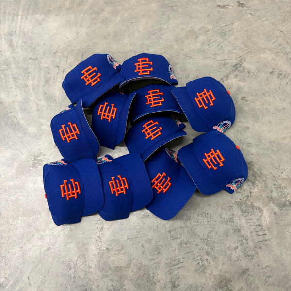 ERIC EMANUEL “BLUE/ORANGE” ADJUSTABLE TRUCKER HAT