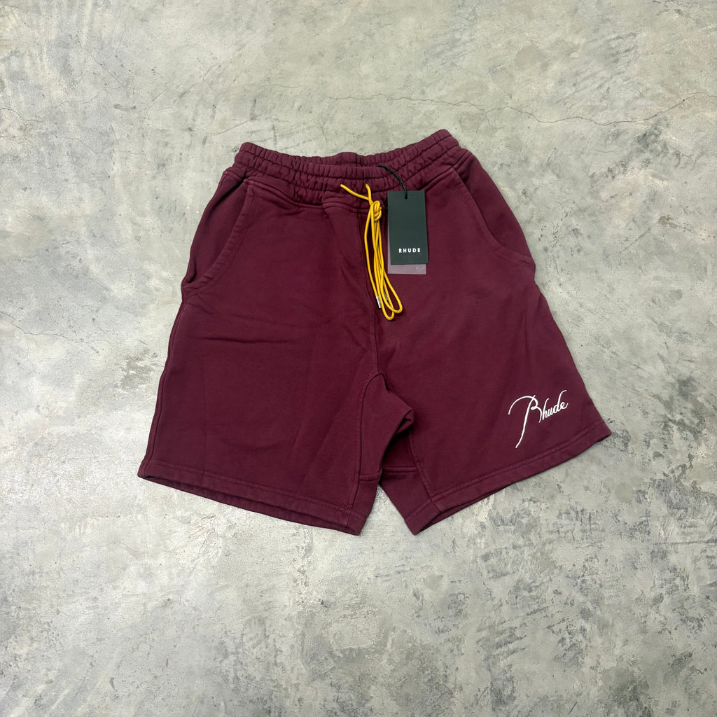 RHUDE “BURGUNDY CURSIVE” SHORTS