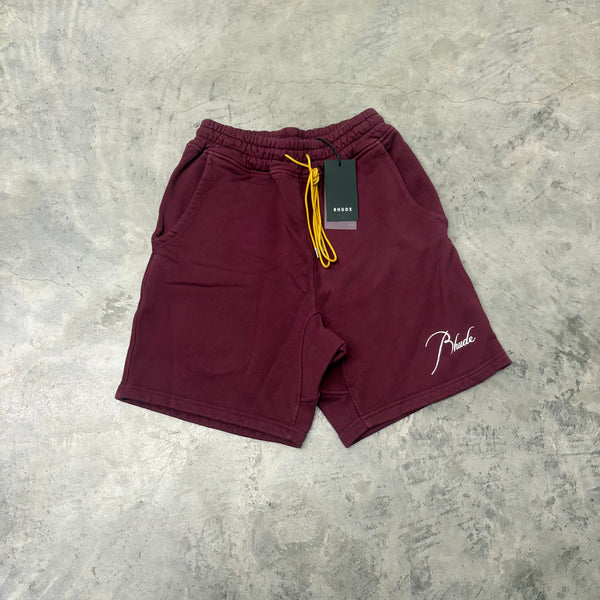 RHUDE “BURGUNDY CURSIVE” SHORTS