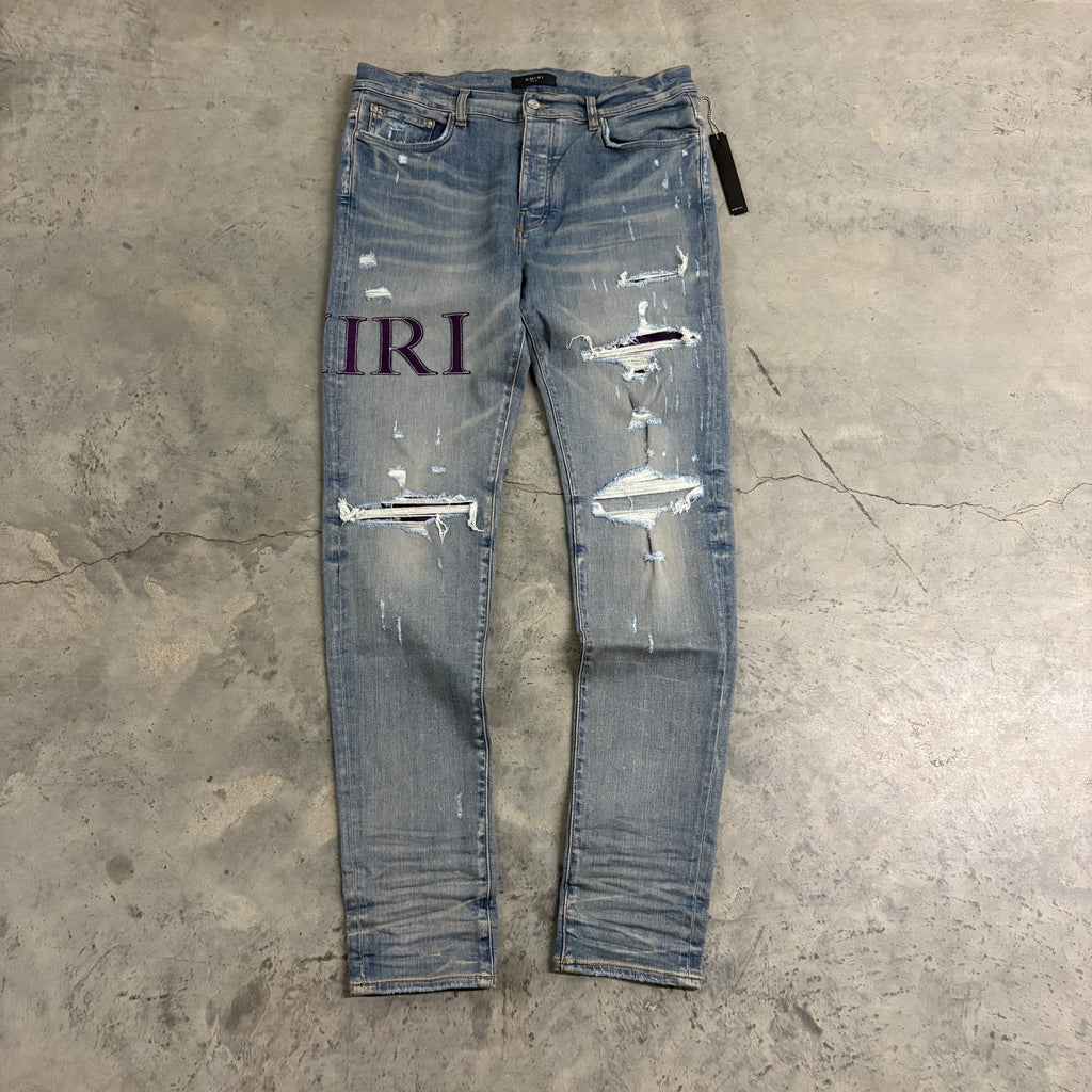 AMIRI JEANS “PURPLE SIDE PATCH”