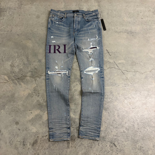 AMIRI JEANS “PURPLE SIDE PATCH”