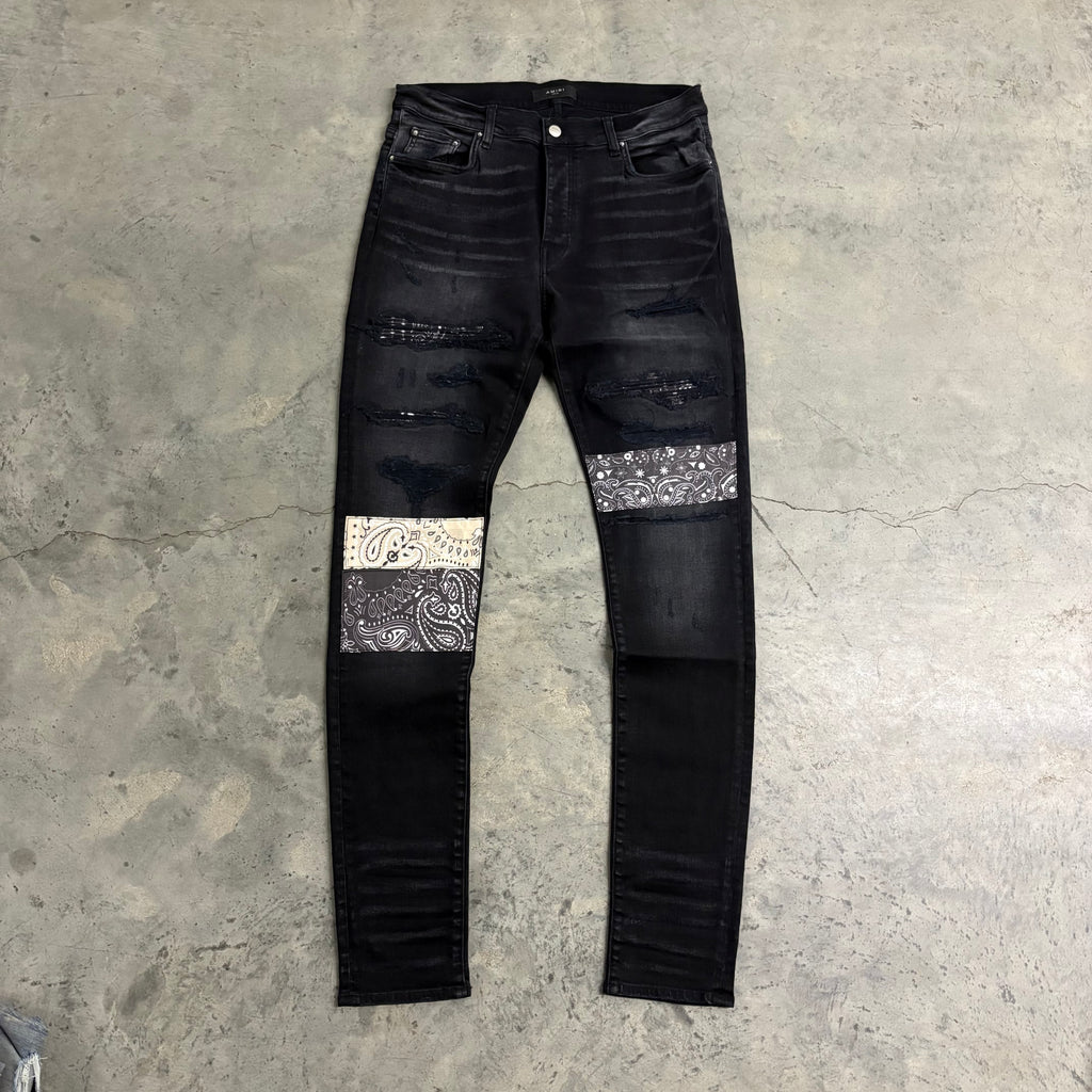 AMIRI “BANDANA PATCH” JEANS
