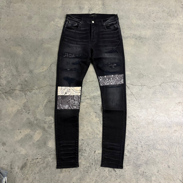 AMIRI “BANDANA PATCH” JEANS